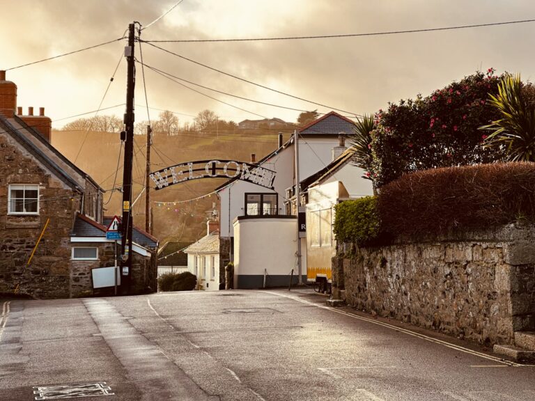 what's on in Cornwall this September - welcome sign into Cornish town